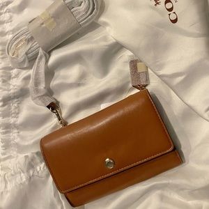 COACH PHONE CROSS BODY IN SMOOTH LEATHER NWT. Smoke free, pet free home. OBO